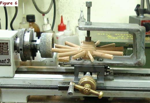 This picture shows a spider (the ring of spokes radiating from the nave) set up in the jig ready for sizing them to fit the prepared felloes, as described in the main text. Here you can see one of the six wheels of the Napoleonic Cannon, Limber and Ammunition Waggon being prepared for fitting to the inside of the ring of felloes.